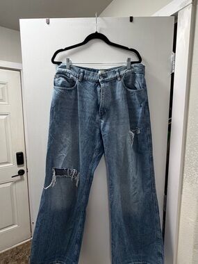 DL1961 Women's Light Blue Relaxed Fit Distressed Jeans